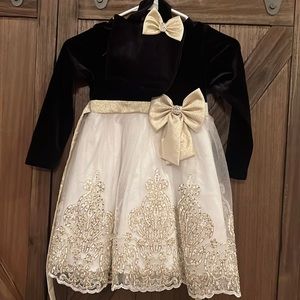 Rare Editions black and gold dress with matching purse. Excellent condition!